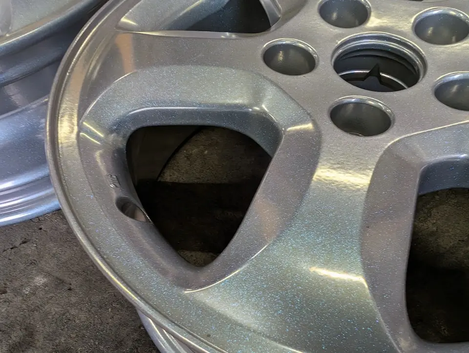 Alloy wheel refurbished and powder coated with a sparkle finish